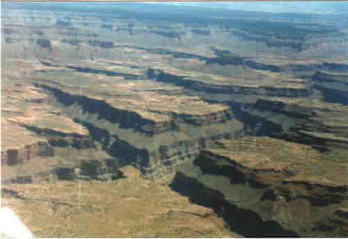 A classic picture of the Grand Canyon, with its deep gorges and  flat plateau