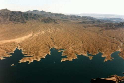 A nice view of lake Mead - deep blue water  with an infinite landscape of dunes - not a man-made  construction in sight!