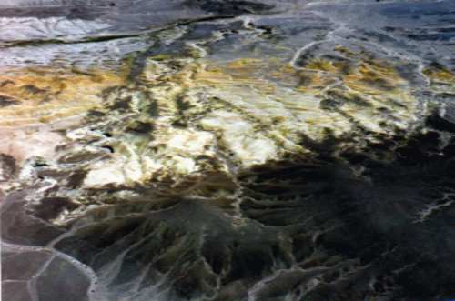 Picture of a yellowish chemical desert - the remains of a lake