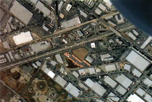 Typical LA overview, with gigantic warhouses, studios, factories or whatever surrounded by highways.